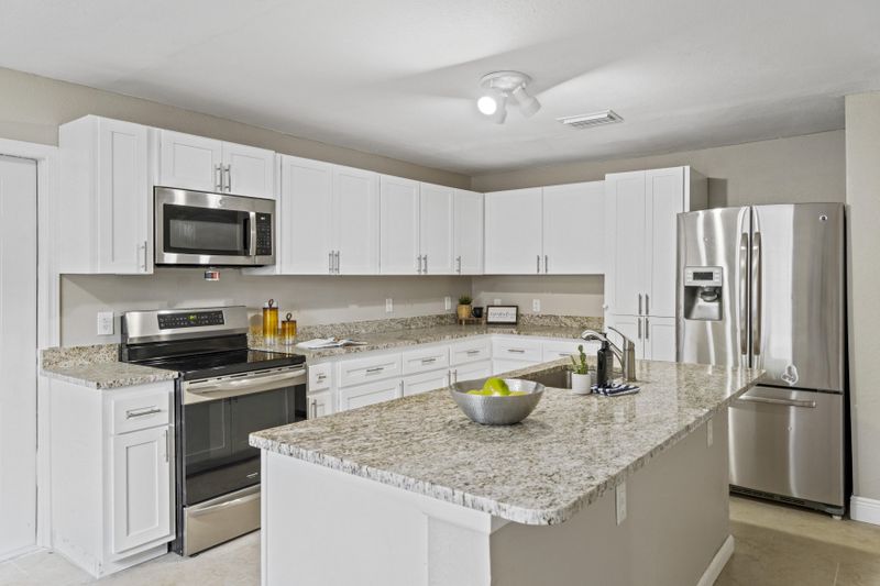 Wonderful and Amazing!! Check out this large Kitchen with a Huge Island to prepare your Meals!! (id. 4994)