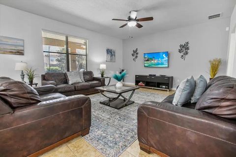 Luxury Pool Home  Close to Disney | Easy Access to I4  | Bedroom w/ Private Bathroom, Private TV, Desk, Chair, Mini Fridge (id. 17797)