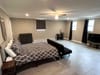 Cozy Meets Modern in Lilburn!  Each Bedroom has TV, Queen Bed, Workspace (id. 17690)