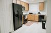 Fully Renovated April 2025  Convenient Location Near Main St  Spacious Rooms with Work Desks  Bus Stop Line 1 within Walking Distance (id. 13266)