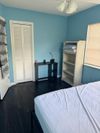 Common areas including living room and TV with large patio and back yard. Easy highway access (id. 13034)