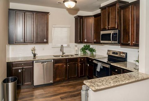Beautiful spacious home in the City of Jonesboro  with Workspace and televisions in each bedroom. (id. 7079)