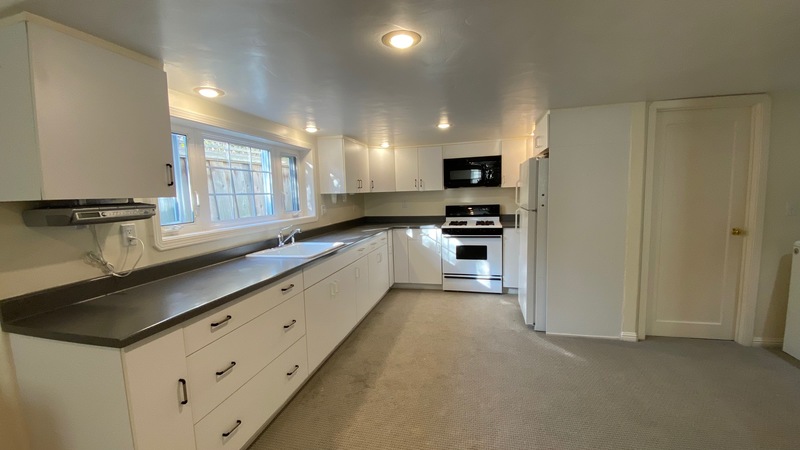 Large basement studio with a yard.