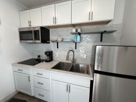 Comfortable & cozy Cedar Creek Tiny home with outdoor sitting area.  Each bedroom has a dedicated TV (id. 11027)