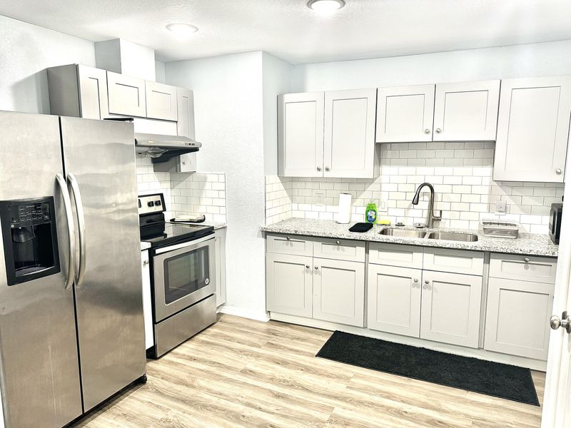 Renovated Spacious Home with SMART TVs, Located Near Public Transit.  All Utilities Included. New Bedroom Furniture. SOLAR-Powered Home Providing Continuous Power During Outages. AVAILABLE TODAY! (id. 10181)