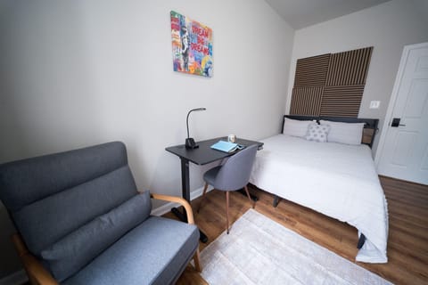 NEW:  Designer Rowhome  - Acoustic-Treated Rooms  Mini-Fridge & Coffee Machine in Every Room  Quiet Backyard  Central AC  Smart Locks  In-Home Laundry  Minutes to Hopkins & Downtown (id. 38154)