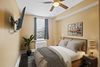 Next to Mondawmin Metro &  Major Bus Routes  Modern & Renovated Baltimore House with  Classic Wood Furniture.  Spacious front porch and rear deck.  All-Utilities Included (id. 6491)